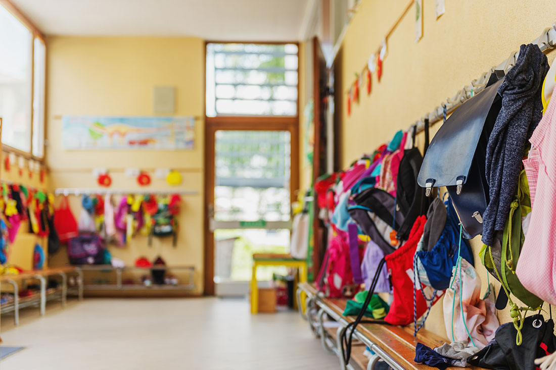 The bags and coats a Staffordshire school's reception class are all hung up nicely.